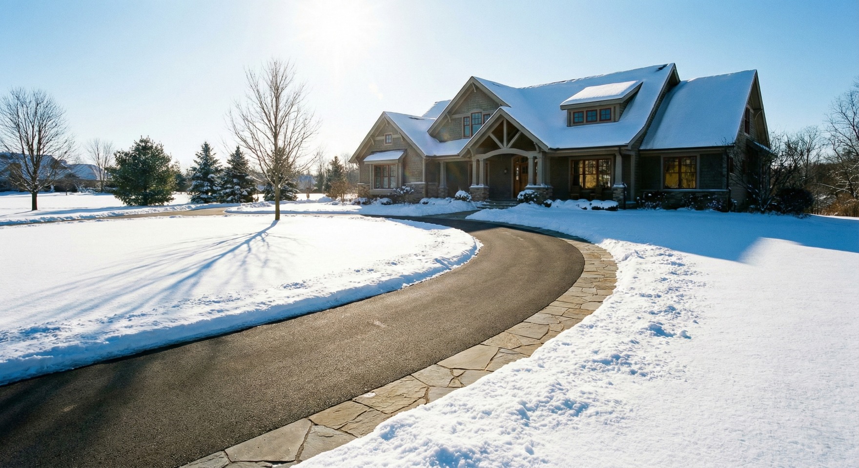 Cleared driveway in winter - snow clearing services in Winnipeg
